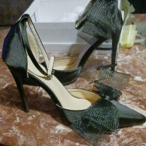 Elegant Black Pointed-Toe Ankle-Strap Heels with Bow Accent In Box